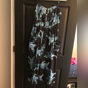 Dark blue sundress with light blue and green pattern.